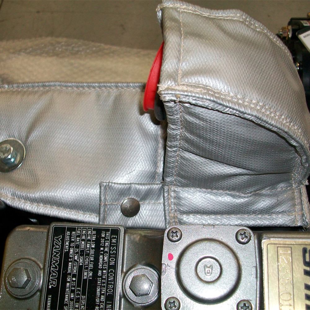 Qual è il materiale migliore per una coperta isolante per i gas di scarico?